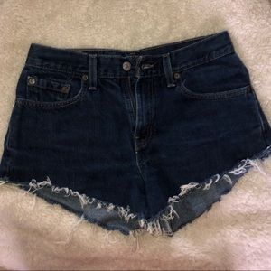 Levi’s dark wash frayed high waisted shorts